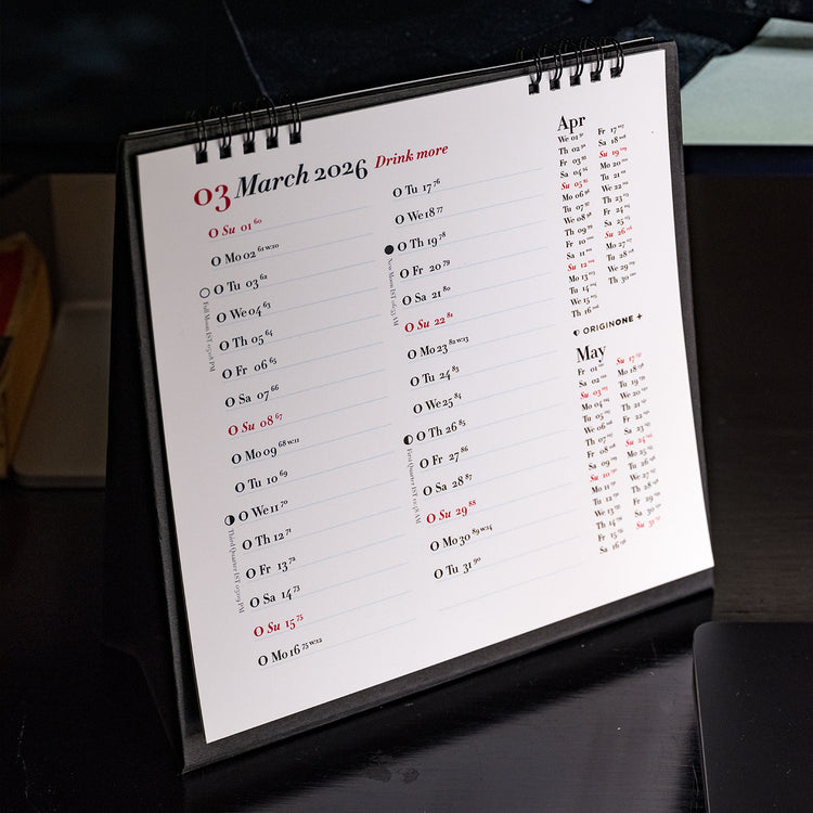 Calendar with March and April 2026 dates on a black surface